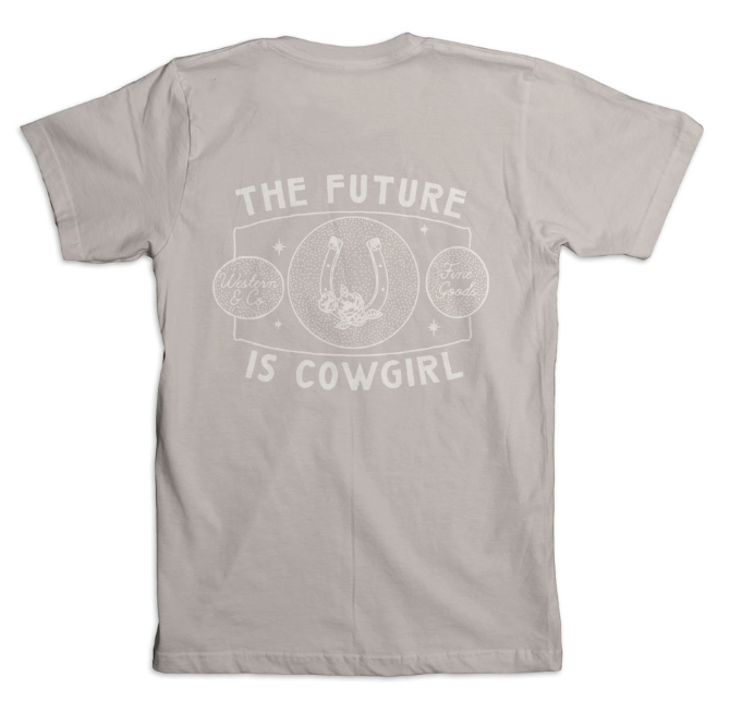 A gray t-shirt with the text 'THE FUTURE IS COWGIRL' and additional graphics related to cowgirl themes.