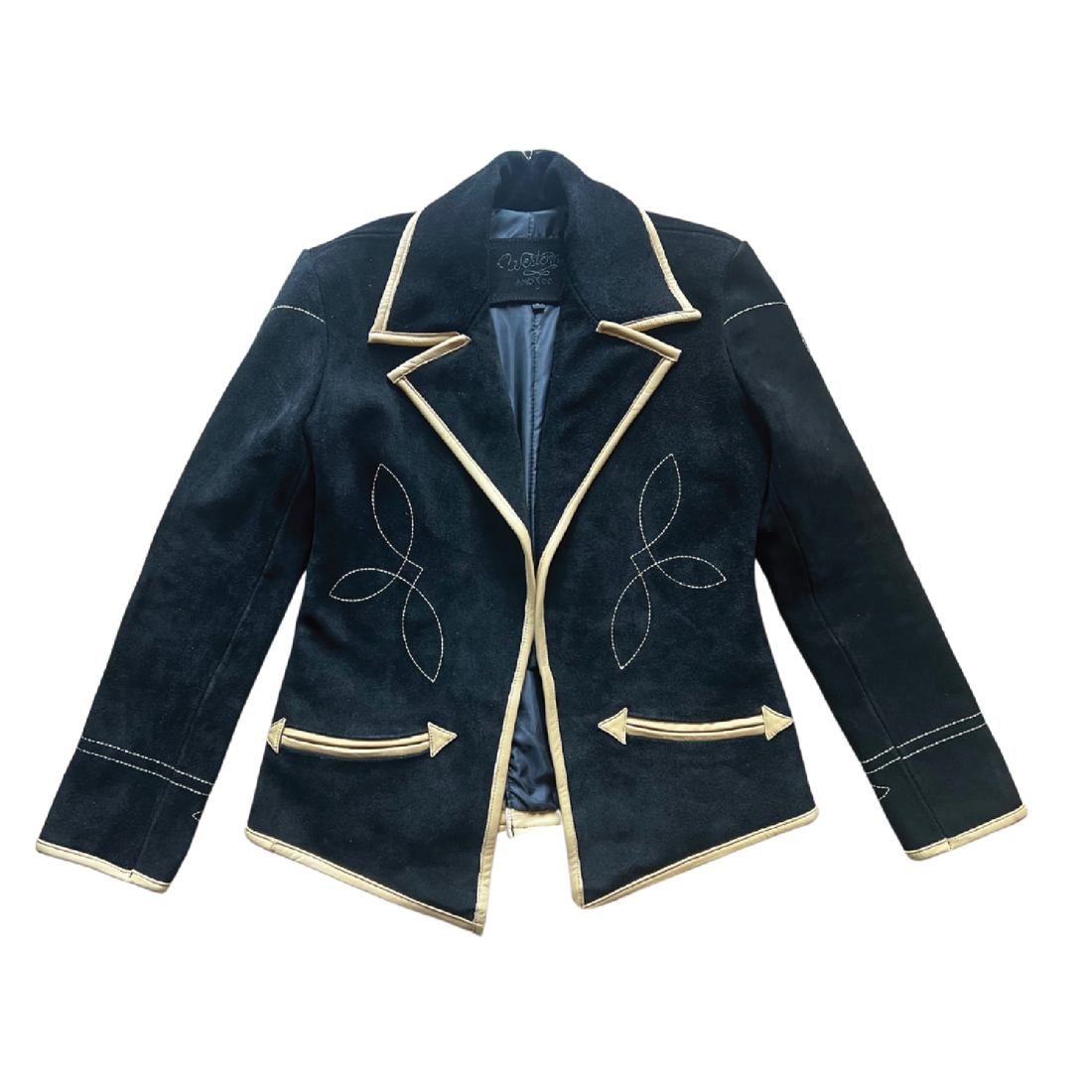 a black suede blazer with tan leather details