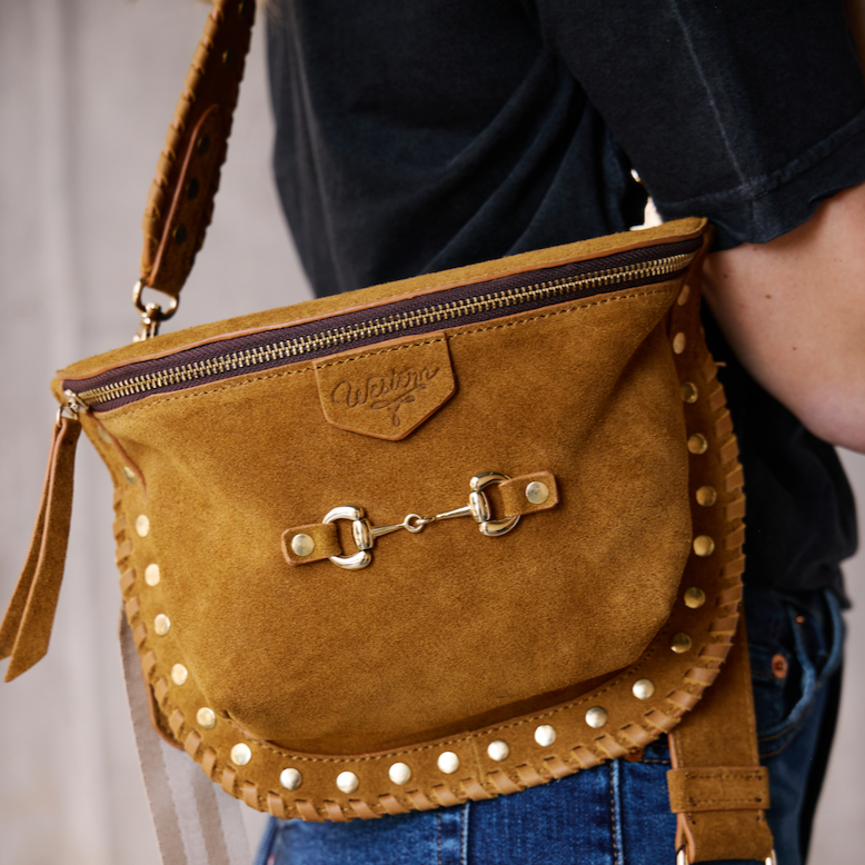 carmel suede bum bag with gold studs and snaffle bit on front