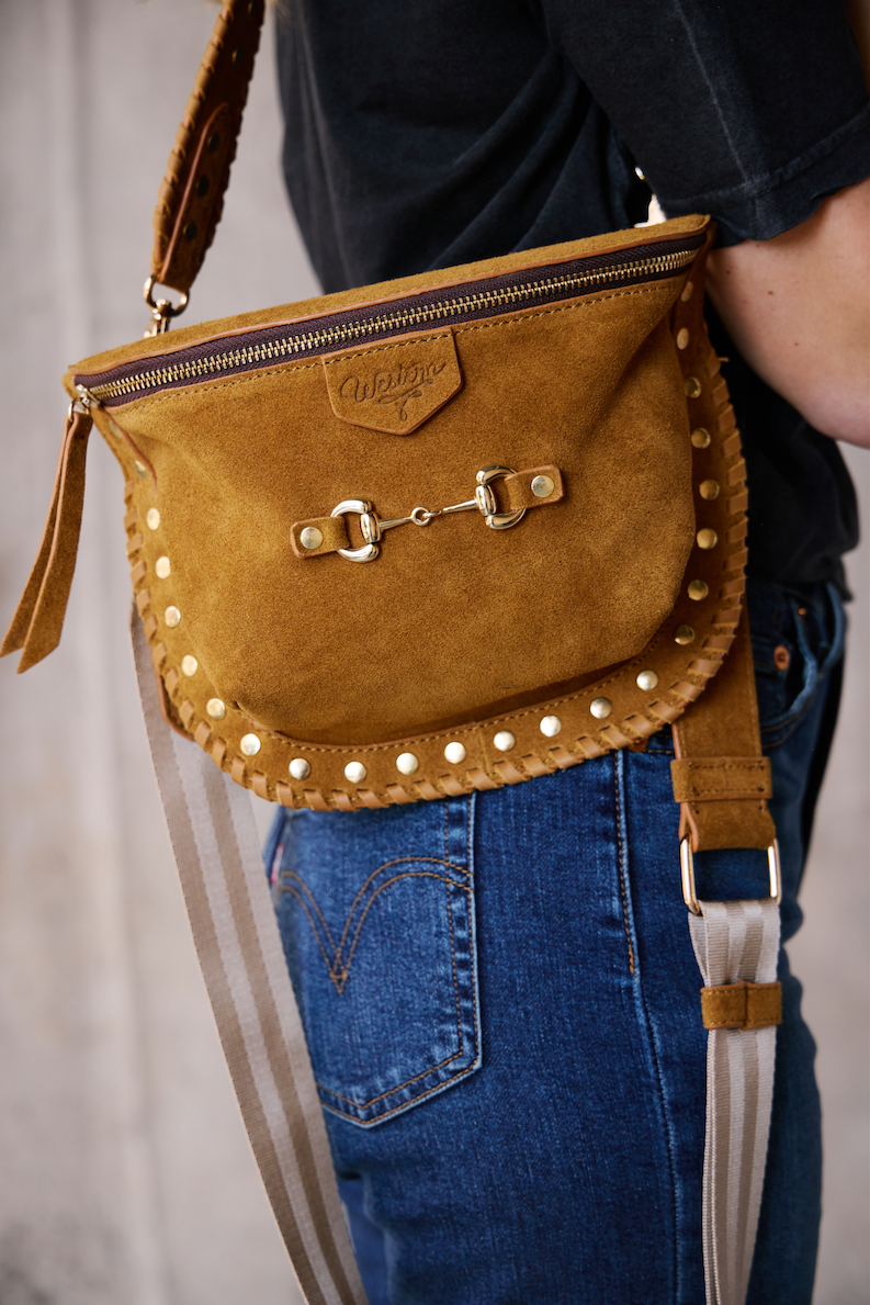 carmel suede bum bag with gold studs and snaffle bit on front